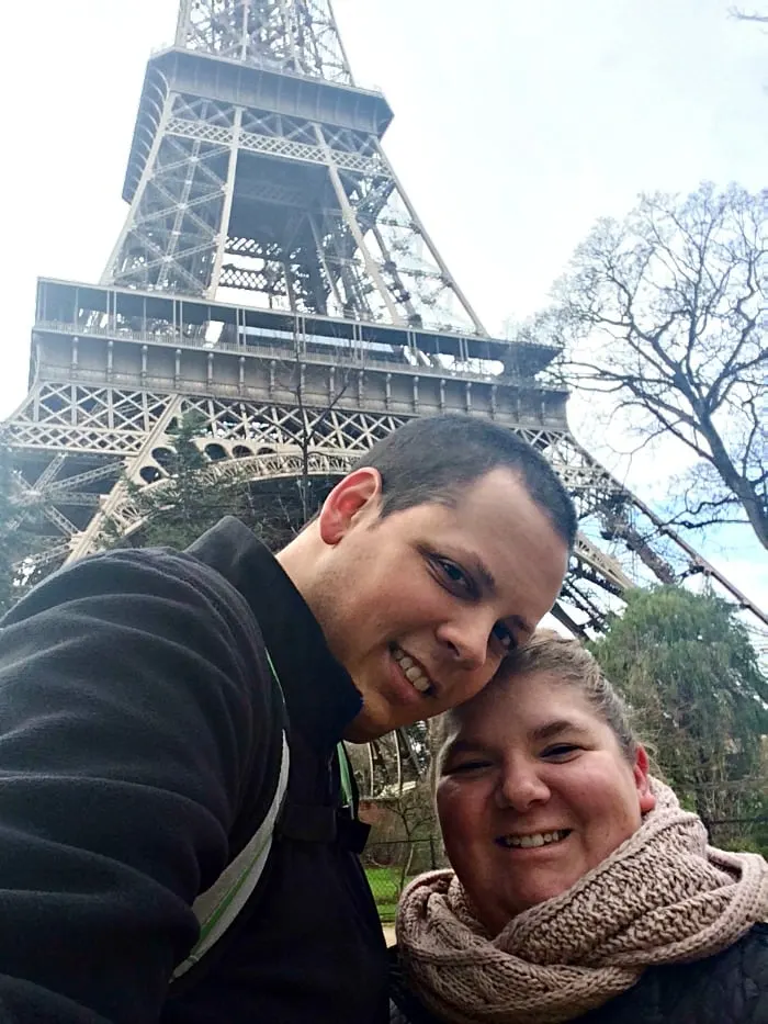 Eiffel Tower in the background of couple