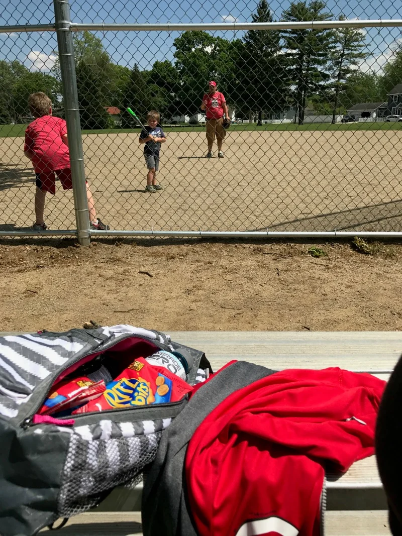 sideline parent view during baseball practice