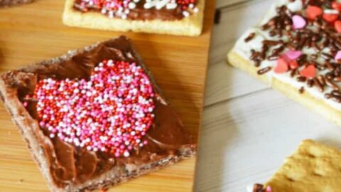 Easy 3 Ingredient Valentine's Day Squares with frosting and sprinkles