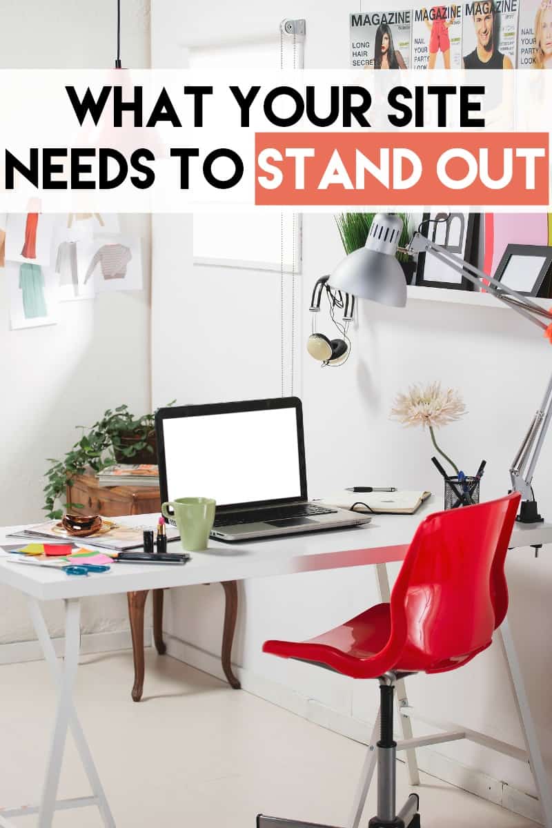View of feminine office space with a white dek and red chair and fashion magazines on the wall