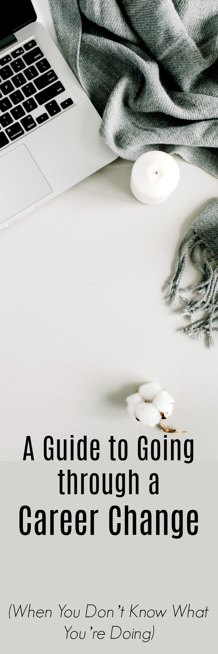grey themed desk with laptop and grey plaid blanket