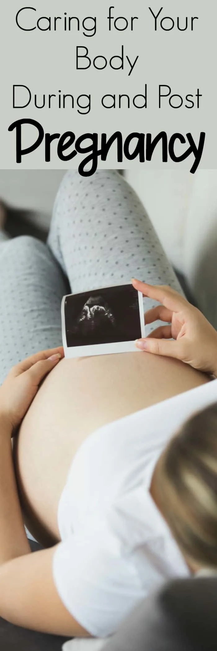 pregnant woman holding ultrasound photo