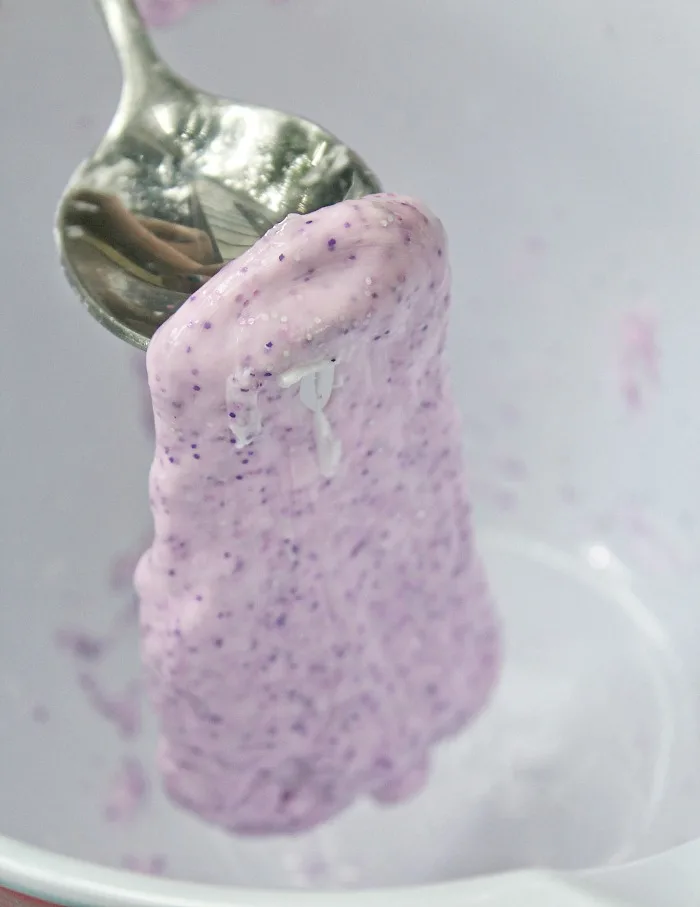 spoon hlding diy purple glitter slime